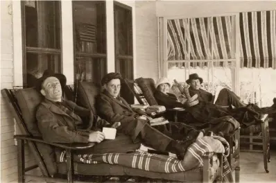  ?? Saranac Lake Free Library via AP ?? ■ In this photo, left, from the late 1800s provided by the Saranac Lake Free Library, tuberculos­is patients rest on the porch of a sanatorium in Saranac Lake, N.Y. The local boom ended with the rise of effective antibiotic treatment in the 1950s, but residents still honor the village’s novel legacy.