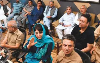  ?? AFP ?? Jammu and Kashmir Chief Minister Mehbooba Mufti speaks during a press conference after submitting her resignatio­n in Srinagar yesterday.