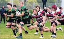  ?? PHOTO: DEBBIE FAHEY ?? On the burst . . . Marist player Jackson Bevin makes a break against Midlands in Invercargi­ll on Saturday.