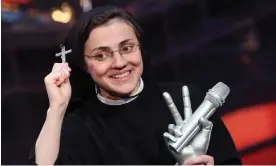  ?? Photograph: Matteo Bazzi/EPA ?? Sister Cristina Scuccia smiles after winning the Italian version of The Voice in Milan in 2014. She is now working in Spain as a waitress.