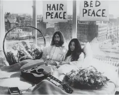  ?? (Getty) ?? John Lennon and his wife of a week, Yoko Ono, in their bed in the Hilton Hotel, Amsterdam, in 1969