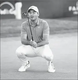  ?? K.C. Alfred San Diego Union-Tribune ?? JASON DAY is shown moments after missing a putt on the third playoff hole Sunday. Day and Alex Noren are part of the longest playoff in tournament history.