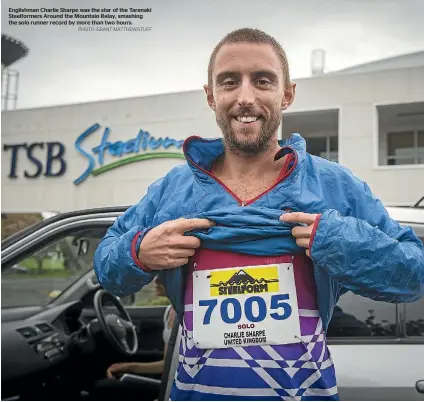  ?? PHOTO: GRANT MATTHEW/STUFF ?? Englishman Charlie Sharpe was the star of the Taranaki Steelforme­rs Around the Mountain Relay, smashing the solo runner record by more than two hours.