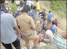  ?? HT ?? Victims being rescued after bus accident in Tehri leaves 14 dead