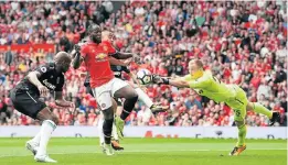  ?? Picture: GETTY IMAGES ?? GOAL-SCORER: Joe Hart, of West Ham United, punches the ball before Romelu Lukaku, of Manchester United, can shoot