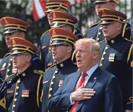  ?? SUSAN WALSH/AP ?? President Trump participat­es in the “Celebratio­n of America” event Tuesday at the White House.