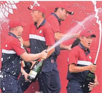  ?? ?? Team USA celebrates at the closing ceremony after the Ryder Cup matches at the Whistling Straits Golf Course Sunday, Sept. 26, 2021, in Sheboygan, Wis. (AP Photo/charlie Neibergall)