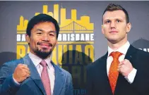  ??  ?? PHILIPPINE BOXER Manny Pacquiao (L) and Australian challenger Jeff Horn pose after a press conference to promote their upcoming WBO welterweig­ht boxing title fight at Suncorp Stadium in Brisbane on June 28. Manny Pacquiao’s world title fight with Jeff...