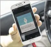  ?? EDWARD LINSMIER / NEW YORK TIMES ?? Josh Streeter, a former Uber driver, shows a screenshot from the Uber app that encourages longer driving. Such messages are intended to exploit people’s preoccupat­ion with goals to maximize Uber’s growth.