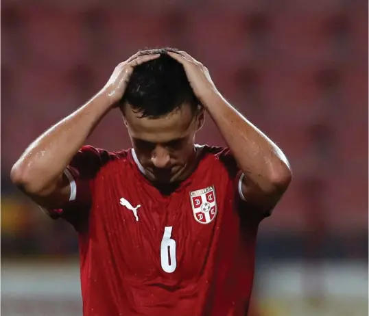  ?? FOTO: DARKO VOJINOVIC/AP, NTB SCANPIX ?? Nemanja Maksimovic fortviler etter at Serbia bommet på en stor sjanse mot Tyrkia i Beograd søndag.