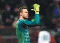  ?? ALEXANDER ZEMLIANICH­ENKO / AP ?? Russia goalkeeper Igor Akinfeev applauds supporters at the end of Friday’s 3-0 friendly loss to Brazil at Luzhniki Stadium in Moscow.