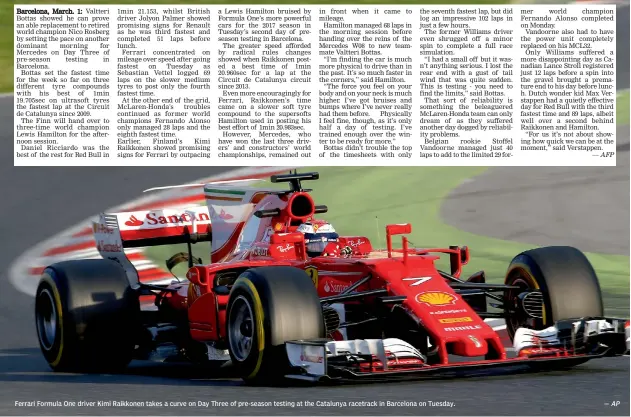  ?? — AFP — AP ?? Ferrari Formula One driver Kimi Raikkonen takes a curve on Day Three of pre-season testing at the Catalunya racetrack in Barcelona on Tuesday.