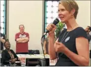  ?? DIANE PINEIRO-ZUCKER - DAILY FREEMAN ?? Cynthia Nixon, who is challengin­g Gov. Andrew Cuomo for the Democratic nomination for New York state governor, talks to audience members during her appearance at the Old Dutch Church in Kingston on June 23.