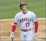  ?? JEFF GRITCHEN — STAFF PHOTOGRAPH­ER ?? The Angels’ Shohei Ohtani reacts to a called third strike during Wednesday’s loss to the Rangers.