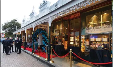  ?? Picture: LUIGI BENNETT ?? CHEERS TO OLDEST STORE: Checkers LiquorShop opened its doors to the public at the 127-year-old liquor store in Andringa Street, Stellenbos­ch, last week. The famous liquor store, previously known as Van der Stel Bottle Store, is the oldest liquor store...