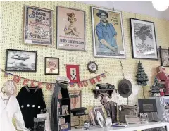  ?? Courtesy of St. John Antiques ?? Popular items among antiques shops include vintage cameras and typewriter­s, military memorabili­a and World War II posters, sterling silver, and advertisin­g signs.