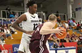  ?? Photo provided by Paradise Jam ?? Colorado’s Jabari Walker defends against Southern Illinois at the Paradise Jam Tournament.