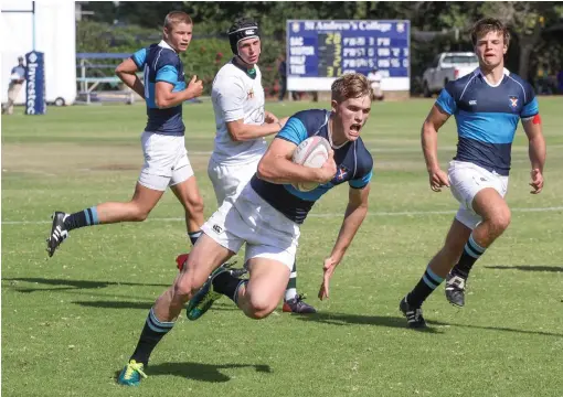  ?? Photo: Stephen Penney ?? Matt More of the St Andrew's College first rugby side scores one of his five tries against Union High XV on Saturday. St Andrew's won their season's opener 64-10. Photograph­s from the match can be viewed and purchased on http:// penneyspix.photofrog....