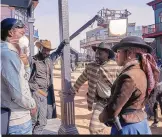  ?? ?? From left, Jeymes Samuel, LaKeith Stanfield as Cherokee Bill, Idris Elba as Rufus Buck and Regina King as Trudy Smith on the set of “The Harder They Fall.”