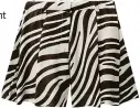 ?? ?? Zebra print shorts, €69, Cos
Leopard print bag, €39.90, Accessoriz­e