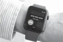  ??  ?? BELOW: The non-cellular version of the Apple Watch Series 3 is displayed in New York.