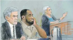  ?? JERRY LEMENU/The Associated Press ?? Former Detroit Mayor Kwame Kilpatrick, sits between his attorneys Harold Gurewitz, left, and Margaret Raben on Thursday. He was sentenced to 28 years in prison for corruption.