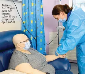  ?? ?? Patient: Liz Hogan gets her chemo after it was prepared by a robot