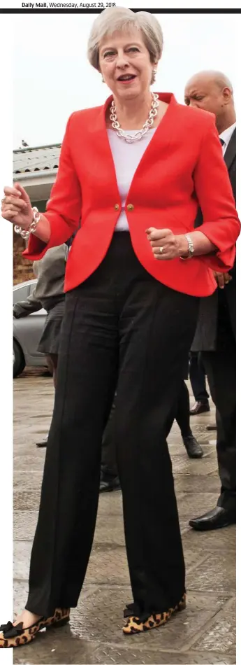  ??  ?? Nice shoes, shame about the moves: Theresa May looks a little awkward