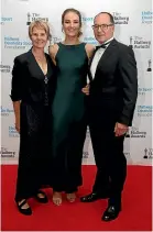  ??  ?? Ellesse Andrews with mum Angela Mote-Andrews and dad Jon Andrews at the 2018 Halberg Awards.