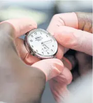  ??  ?? Pierre Pullet assembles a watch at the Shinola Watch factory earlier this momth.