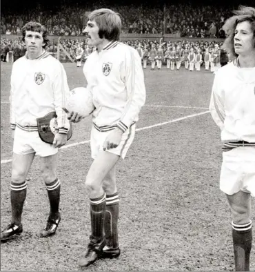  ??  ?? October 30, 1974 - the day of Mick Wallace’s first internatio­nal, as team captain Johnny Giles, Steve Heighway ay and debutant Liam Brady prepare to take on the Soviet Union in a heaving Dalymount Park.