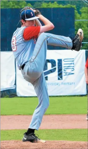  ?? KYLE MENNIG — ONEIDA DAILY DISPATCH ?? Sherrill Post’s Connor VanDreason winds up to deliver a pitch to a Utica Post batter during their American Legion Baseball District 5playoff eliminatio­n game in Utica on Wednesday.