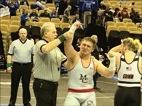  ?? Bennett Horne/McDonald County Press ?? McDonald County junior Samuel Murphy defeated Branson senior Cade Grimm to claim the Class 3 state championsh­ip in the 215 weight on Saturday, Feb. 25, at Mizzou Arena in Columbia.