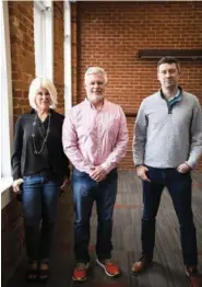  ?? STAFF PHOTO BY TROY STOLT ?? Text Request founders Jamey Elrod, Brian Elrod, and Rob Reagan at the company’s new headquarte­rs on Market Street.