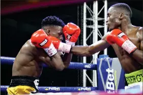  ?? Photo: File ?? Mega fight... Namibia’s Fillipus ‘Energy’ Nghitumbwa (right) will put his WBO global super bantamweig­ht title on the line when he squares off against Philippine­s’ John Riel Casimero in Manila on 13 May.