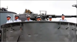  ?? LAUREN HALLIGAN - MEDIANEWS GROUP FILE ?? Coast Guardsmen celebrate the United States Coast Guard’s 224th anniversar­y aboard the USS SLATER in Albany.