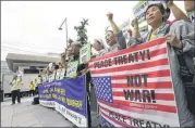  ?? AHN YOUNG-JOON / ASSOCIATED PRESS ?? South Korean demonstrat­ors stage a rally in August near the U.S. Embassy in Seoul, South Korea, against the deployment of an advanced U.S. missile defense system.