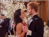  ?? THE CANADIAN PRESS/HO, CORUS ENTERTAINM­ENT ?? Murray Fraser as Prince Harry and Parisa Fitz-Henley as Meghan Markle are shown in a scene from Lifetime's "Harry & Meghan: A Royal Romance" in this undated handout photo.
