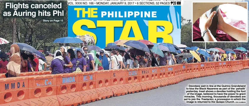  ?? EDD GUMBAN ?? Devotees wait in line at the Quirino Grandstand to kiss the Black Nazarene as part of the ‘ pahalik’ yesterday. Inset shows a devotee holding the foot of the image, believed to have the power to grant miracles. This morning, thousands of devotees are...