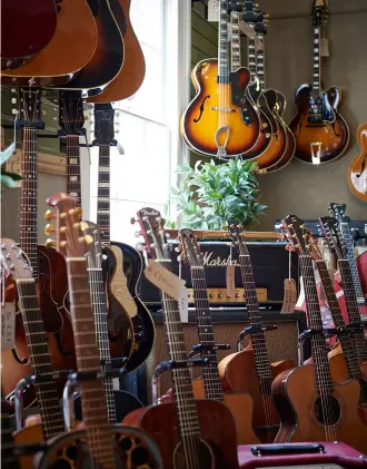  ??  ?? There’s plenty of choice on the vintage market. This phalanx of classic acoustics is on show at Vintage ’n’ Rare Guitars in Bath