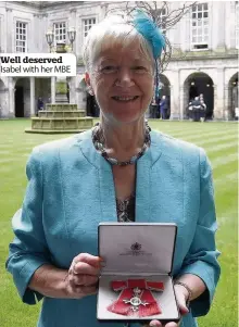  ??  ?? Well deserved Isabel with her MBE