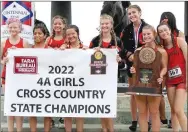  ?? SUBMITTED PHOTO ?? The Gravette High School girls’ cross-country team won the 4A state championsh­ip at the state meet in Hot Springs on Thursday.