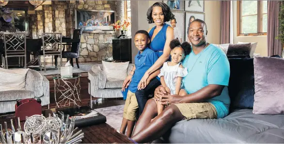  ?? PHOTOS: MIKE MORGAN/THE WASHINGTON POST ?? Monique Samuels — seen with her husband Chris Samuels, and kids Christophe­r and Milani — is in her second season on Bravo’s The Real Housewives of Potomac. Chris, who retired from the NFL in 2010, and Monique turned their love of real estate into part of their narrative on the reality television series.