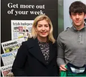  ??  ?? Arlene Regan and Chris Davies present Adrian Cummins with his jersey