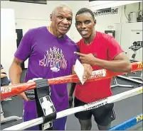  ?? Picture: SUPPLIED ?? UNSCATHED: Xolisani Ndongeni, right, seen here with Floyd Mayweather Snr, has not been affected by the Las Vegas shooting