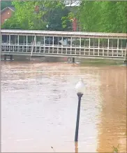  ??  ?? The waters of Euharlee Creek rose high enough to flood the Silver Comet Trail and Seaborn Jones Park in downtown Rockmart.