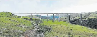  ?? /Supplied ?? Bridge over troubled waters: An artist’s impression of the R1.65bn 220m-high bridge across the Mtentu River in the Eastern Cape.