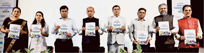  ?? ?? (From left) Bhargavi V.R., professor and director Postgradua­te Department of Commerce Seshadripu­ram College; Soubhagya S. Beelagimat­h, AIR 101 UPSC CSE 2023; Yeshwanth Grukar, executive director, Centre for Smart Governance Department of P&A Reformer (e-Gov); Vidhyashan­kar S.,Vice-Chancellor, Visvesvara­ya Technologi­cal University; Riyaz Basha Sardar, Registar (Evaluation) RGUHS; Uttam Kumar Badiger, Senior Assistant Karnataka Examinatio­n Authority; Ameen-e-Mudassar, founder and CEO CIGMA Internatio­nal Career Counsellor, and Sangappa S.B., National Executive Council Member, ISTE, New Delhi, during the career counsellin­g programme in Bengaluru on Saturday. SUDHAKARA JAIN