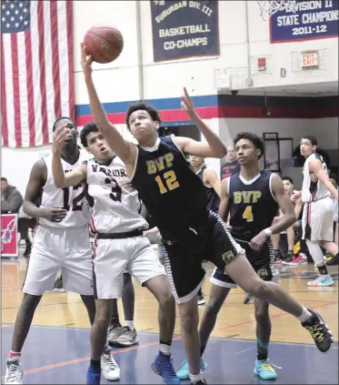  ?? Photo by Ernest A. Brown ?? Blackstone Valley Prep forward Xavier Mendez (12) scored 11 points for the 11th-seeded Pride, but Central Falls secured a 62-55 Division III preliminar­y-round win to advance to the quarterfin­als against No. 3 Ponaganset.