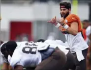  ?? DAVID DERMER — THE ASSOCIATED PRESS ?? Cleveland Browns quarterbac­k Baker Mayfield signals during training camp Aug. 7 in Berea.